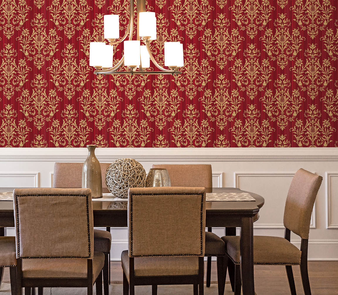 Red and gold damask silks wallpaper in a modern dining room table and chairs