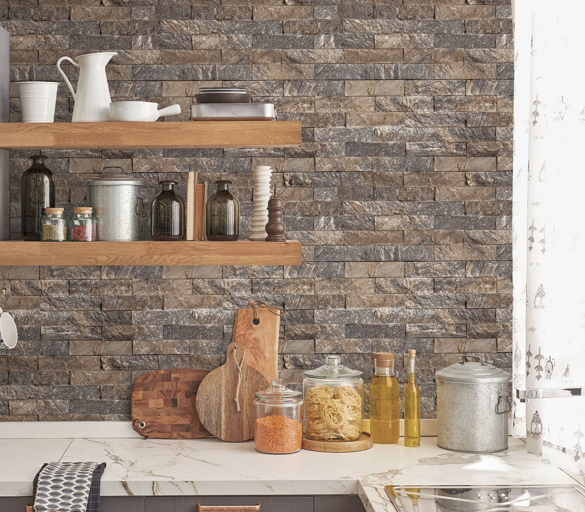 Kitchen counter with slate tiles in grey and warm browns wallpaper