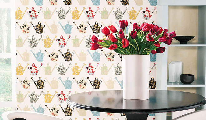modern kitchen with patterned watering cans wallpaper