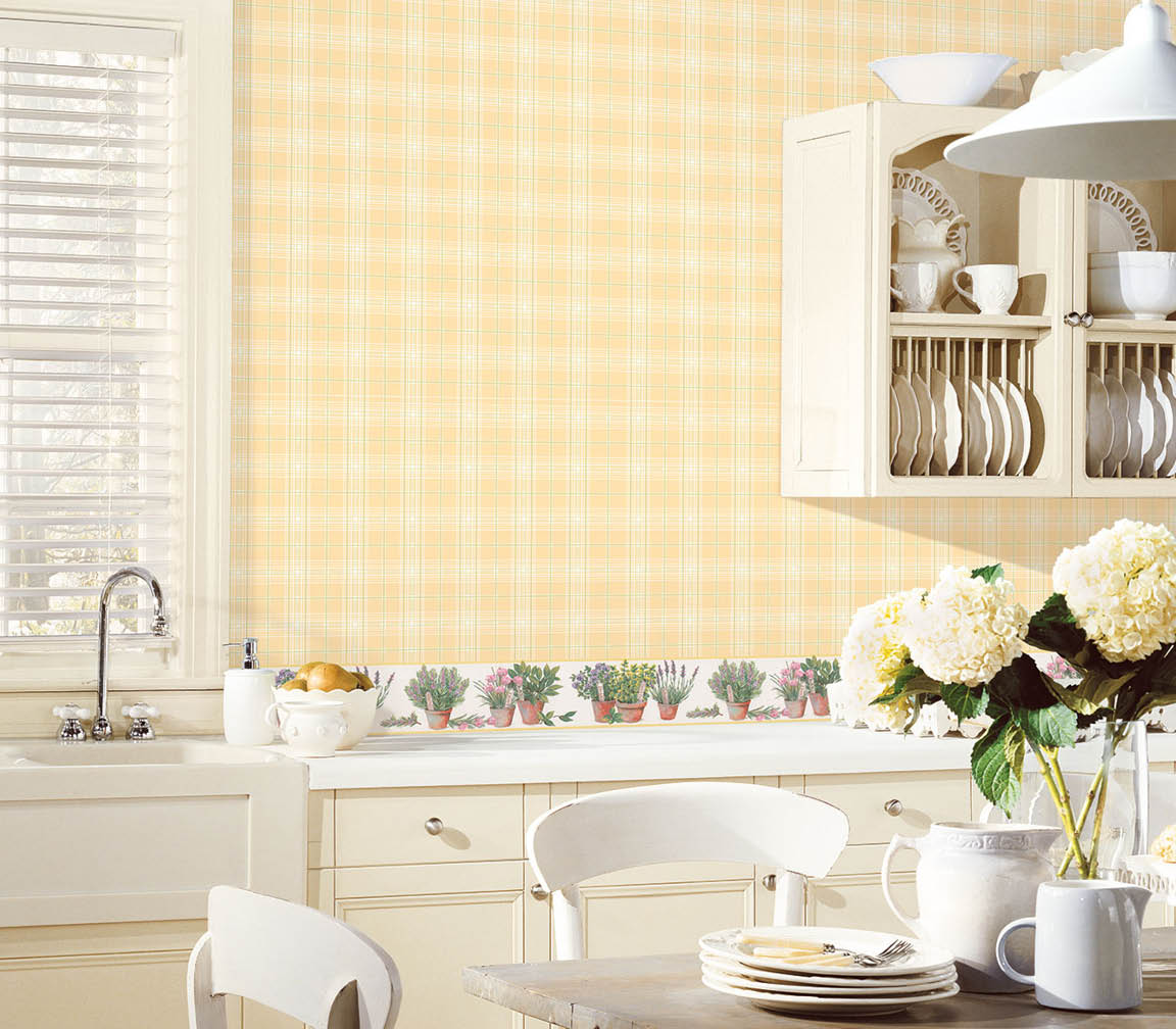 kitchen with yellow and green plaid wallpaper and herb pots border