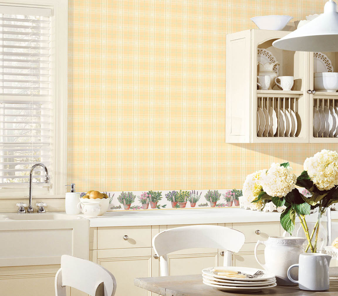 kitchen with yellow and green plaid wallpaper and herb pots border