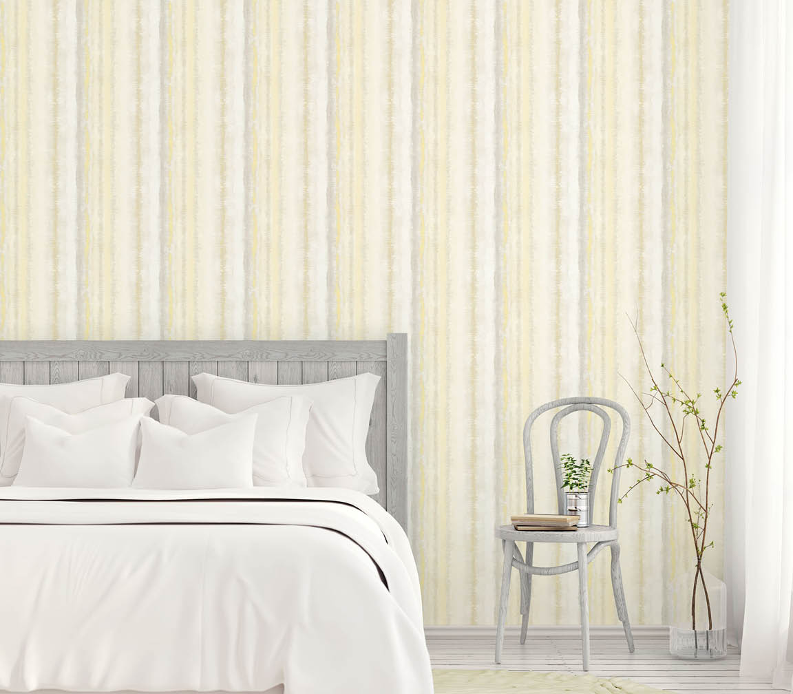 bedroom with watercolour stripe yellow and grey wallpaper