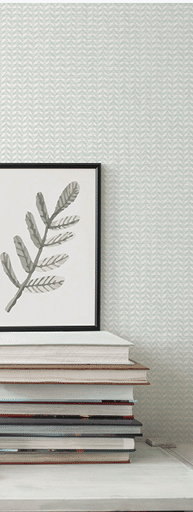 Book shelf with small leaf in mint wallpaper