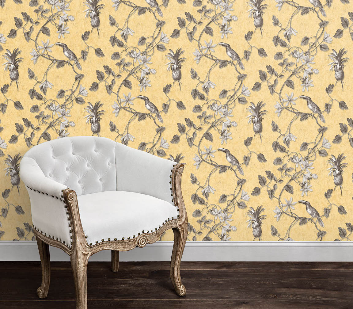 velvet luxury chair with an indochinese tucan toile in yellow and charcoal wallpaper