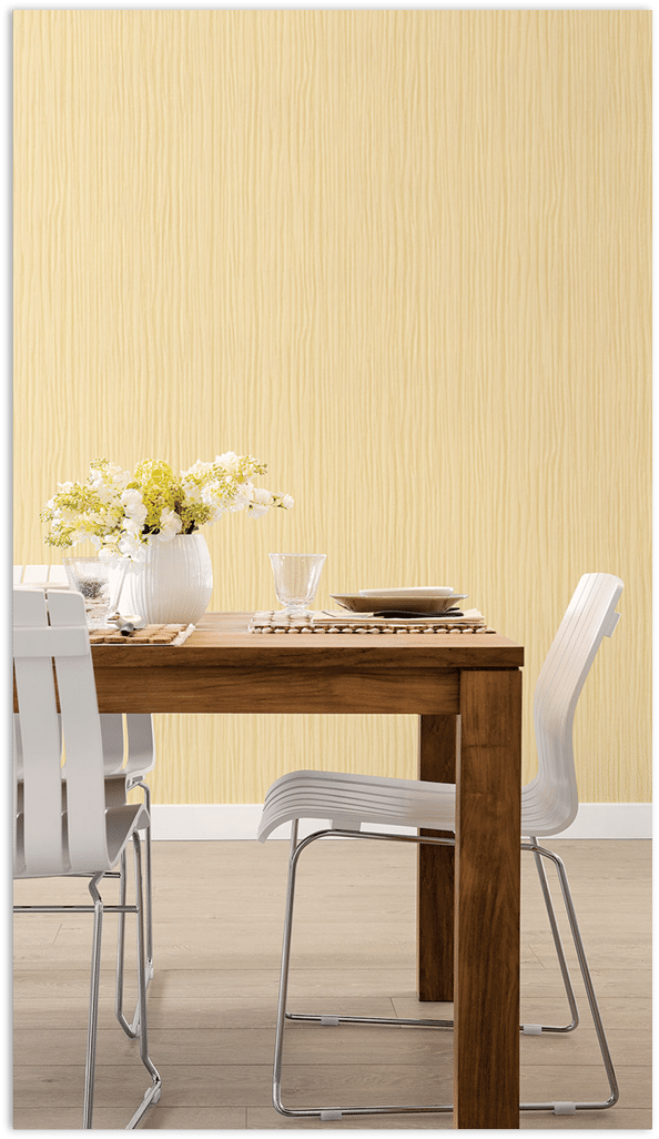 Yellow raffia texture wallpaper in a modern dining room  14 Nov 2012 --- White chairs at wooden dining table --- Image by   Hero Images Corbis