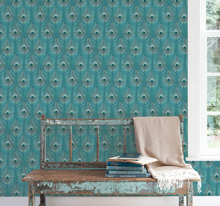 An interior space of bench by a window with teal peacock feather wallpaper