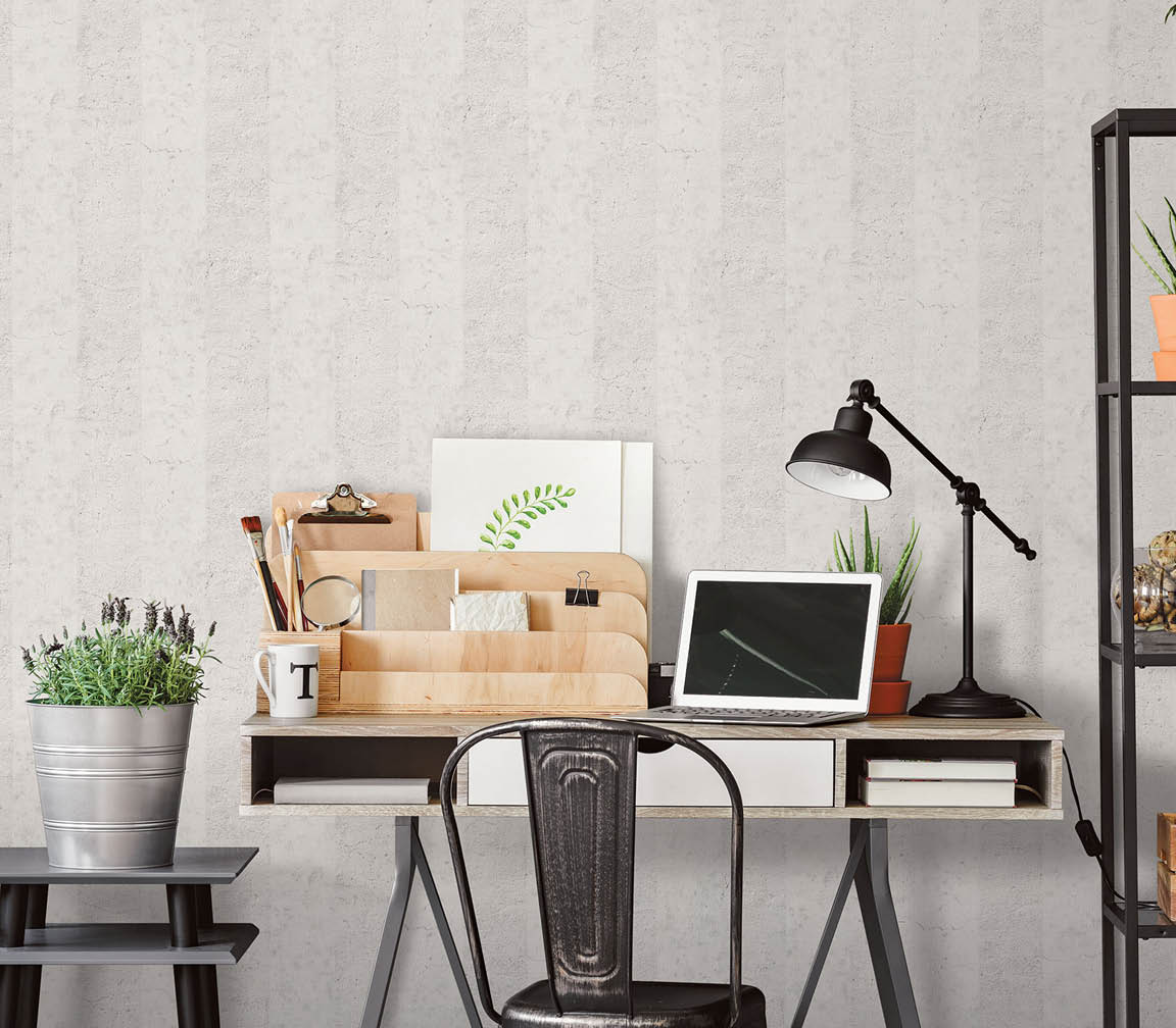 Office desk with grey striped concrete wallpaper