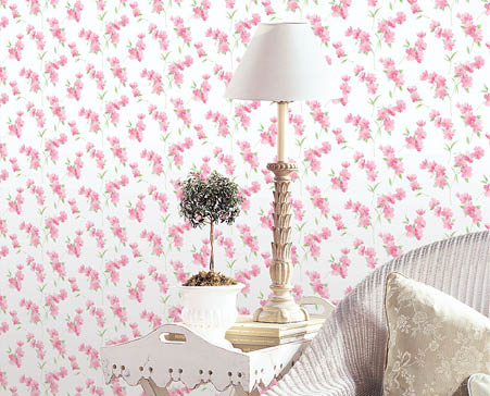 living room with pink and green floral wallpaper