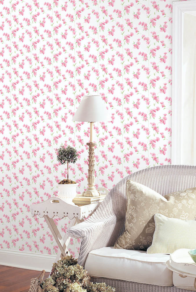living room with pink and green floral wallpaper